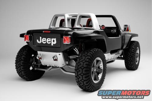 Black Jeep concept vehicle, rear view, with large off-road tires and a roll cage