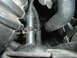1994 Ford Probe - Engine bay detail showing hoses and a plastic component.