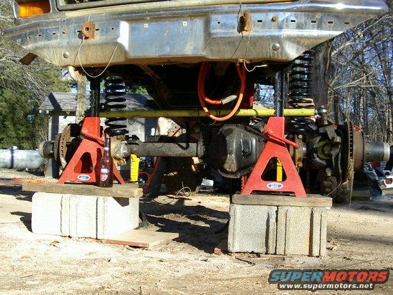 1985 Ford Bronco front axle and suspension on jack stands