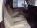 1979 Ford Bronco - The interior of a 1979 Ford Bronco, bucket seats and a dashboard, is visible in this photograph.