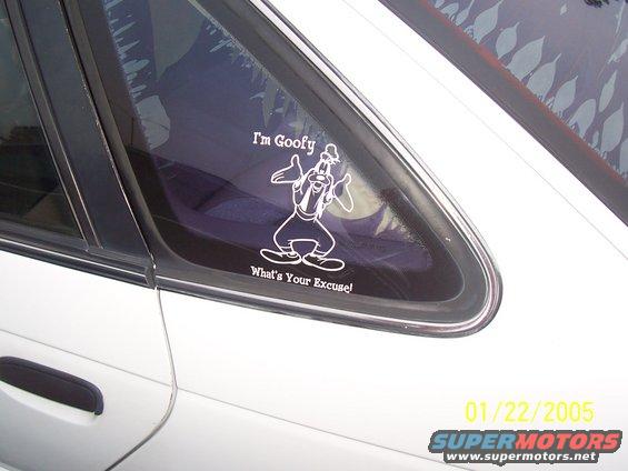 White car's rear side window with a Goofy sticker saying 'I'm Goofy What's Your Excuse!'