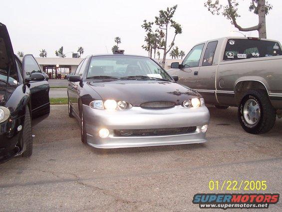 1998 Mercury Sable front with aftermarket bumper and dark hood