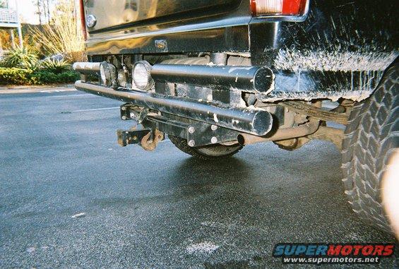 1996 Ford Bronco rear bumper with tow hitch and auxiliary lights