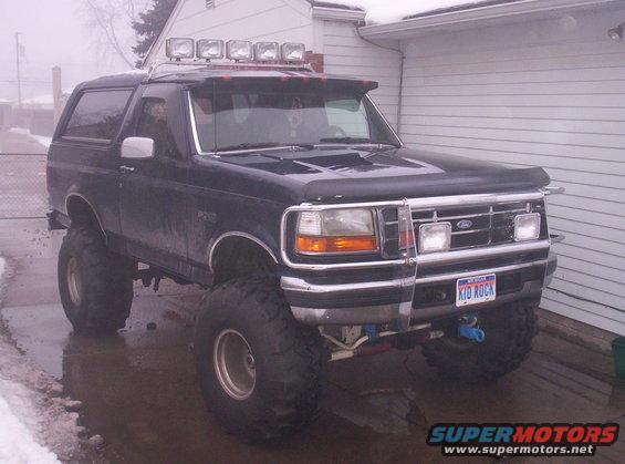 Lifted 1993 Ford Bronco with off-road lights and a bull bar