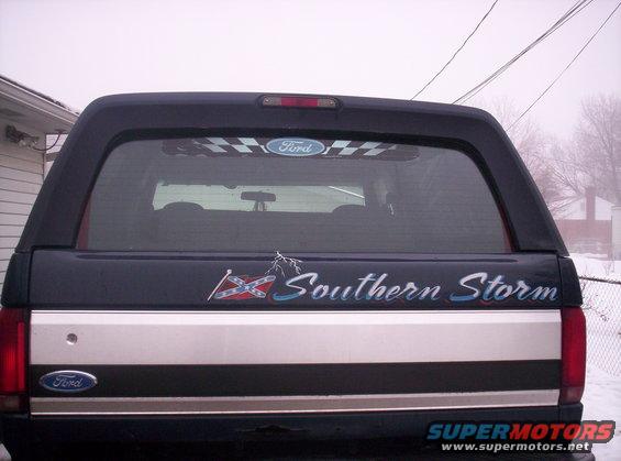 Dark blue Ford Bronco rear with silver stripe and 'Southern Storm' decal