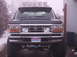 1993 Ford Bronco - This 1993 Ford Bronco features a prominent light bar and a heavy-duty brush guard on its front end.