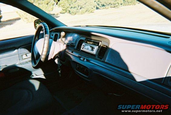 2000 Ford Crown Victoria interior showing dashboard, steering wheel, and radio