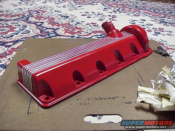 Red finned valve cover with silver accents
