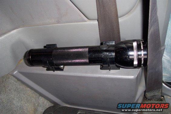 dcp_1887.jpg Medium length Mag mounted over the seat belt retractor  