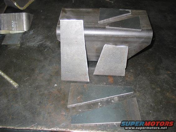 hangerpieces.jpg The parts I cut out to build a heavy duty spring hanger.