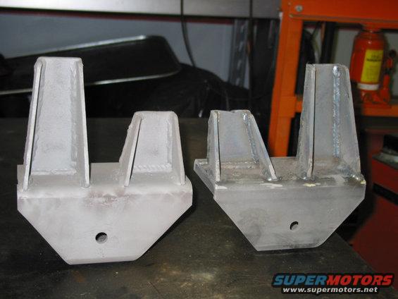 pairofhangers.jpg Both hangers with the welding finished. The one on the left has been abrasive blasted for paint, but both need final cleanup and some more massaging.