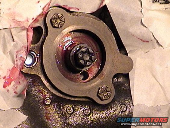 dsc00004.jpg Cam thrust plate stock, needs to be modified to clear torrington bearing on timing gear.