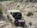 1978 Ford Bronco - This 1978 Ford Bronco is navigating a steep, dusty incline during an off-road excursion.