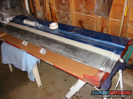 This is after the rusty bottom half was cut away. I had already sand-blasted the inside of the shell, then coated the inside with primer and black paint while it was open from the bottom. 