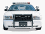 1998 Ford Crown Victoria - Front view of a 1998 Ford Crown Victoria police car equipped with a push bumper and light bar.