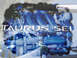 2002 Ford Taurus - Overlay of text and images, including an engine and two cars, with "Taurus SEL" prominently displayed.
