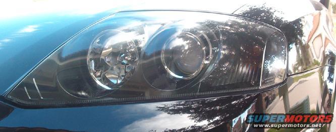 Removed orange reflector and inner housings painted black.