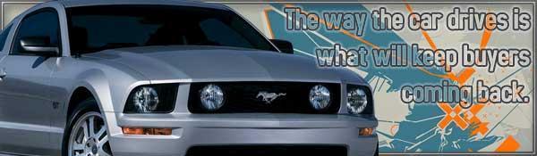 Silver Ford Mustang front view with text overlay