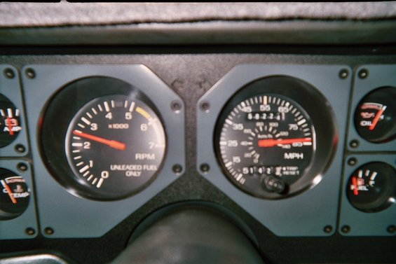 1985 Ford Mustang dashboard gauges with tachometer and speedometer