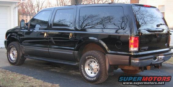 Black 2001 Ford Excursion rear three-quarter view