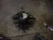 1998 Volkswagen Jetta - A radiator fan is shown lying on a concrete surface.
