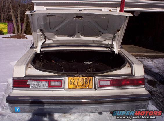 1991 Ford Crown Victoria LTD rear with trunk open, showing yellow New York license plate 627-DBY