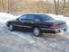 1992 Ford Crown Victoria - Rear view of a 1992 Ford Crown Victoria in a snowy environment.
