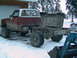 1981 Chevrolet C/K Pickup - This pickup truck chassis, likely from the 1970s, is missing its bed and sits in a snowy environment.