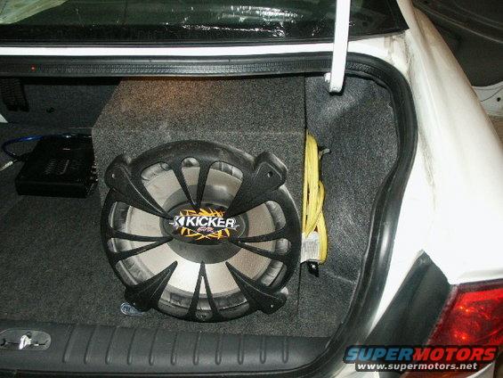 Car trunk with Kicker subwoofer and amplifier installed