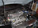 1994 Ford Probe - Engine bay view showing a Ford engine with aftermarket intake and air filter modifications.