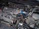 1994 Ford Probe - Close-up of a Ford engine a custom-fabricated intake manifold and a cone air filter.