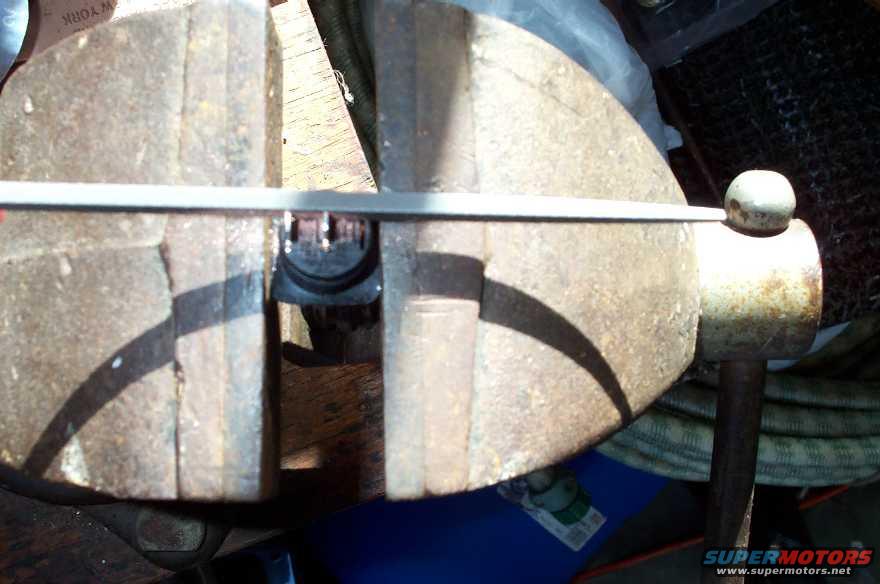 filing-new-switch.jpg In order for the new SPST flip switch to fit the OEM blade-style harness, I had to use a file to thin down the SPST's connector blades.