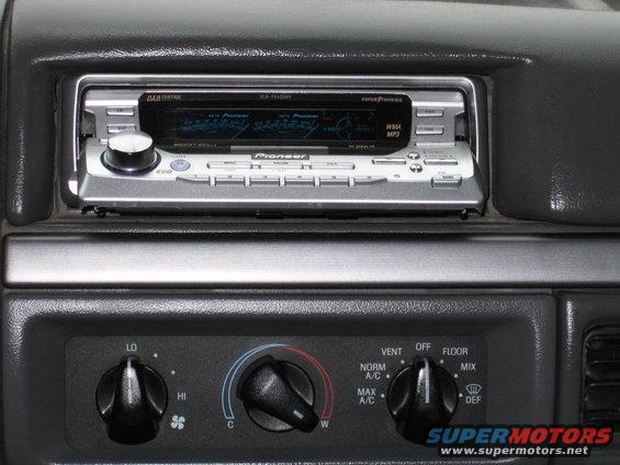 Car dashboard with Pioneer stereo and climate control knobs