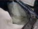 1998 Volkswagen Jetta - This image shows the interior of a car's fender well, likely undergoing bodywork or repair.