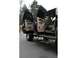 2000 Ford Excursion - side view with auto steps