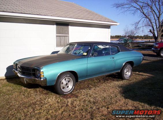 Teal 1971 Chevrolet Chevelle coupe with a black vinyl roof and matte black hood