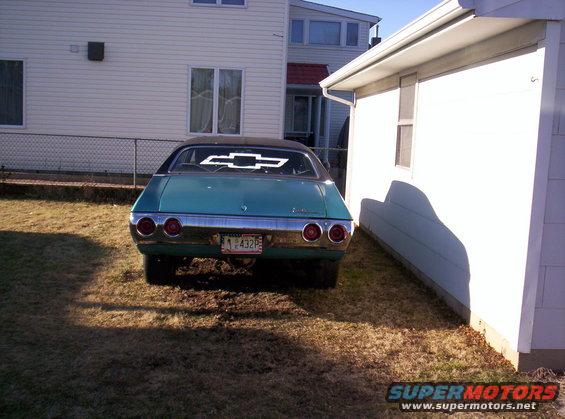 Teal 1971 Chevrolet Chevelle rear view with chrome bumper and dual taillights