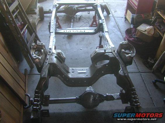dscn9014.jpg new dana 44 solid axle and ford 9" rear end lined up behind the old 8.8 (still need gears, locker, axle shafts, disk brakes, suspension mounts) 