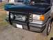 1987 Ford Bronco - Installed a grille guard and two lights.