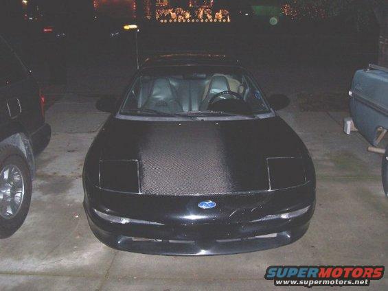 1993 Ford Probe front view, black with carbon fiber hood