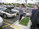 1993 Ford Probe - Several silver Ford Probes are gathered, their hoods open, in a parking lot.