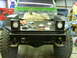 1990 Ford Bronco - Custom truck bed modification in progress, showing tools and parts on the deck.