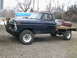 1977 Ford F-250 - This 1977 Ford F-250 flatbed truck is equipped with a heavy-duty push bumper and auxiliary lighting.