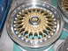 1998 Volkswagen Jetta - Close-up of an MSW gold mesh alloy wheel, showing its intricate design and polished rim.