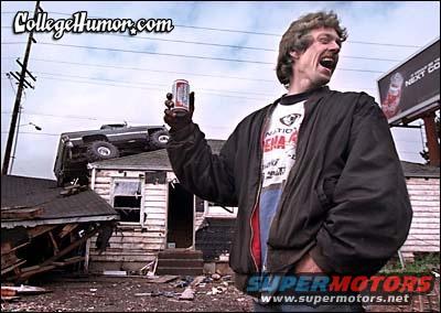 Monster truck on a house roof, man holding a can, damaged house, CollegeHumor.com logo