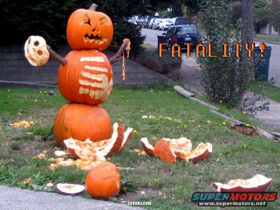 Pumpkin snowman decoration with 'FATALITY!' text overlay and cars parked on street
