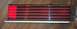 1985 Ford Crown Victoria LTD - This taillight assembly features horizontal chrome trim and distinct red sections, likely for a vehicle part.