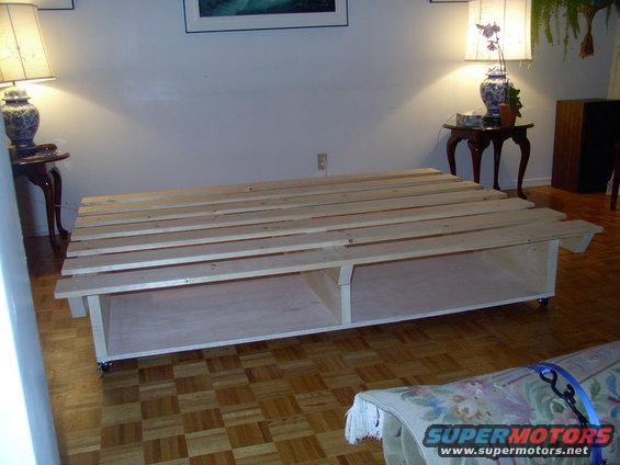 img_0186.jpg Here's the bed frame with next to no cutting (by me) required. Home Depot and Perkins Lumber did almost all the slicing (and damned well too) so all I had to do was screw her together.