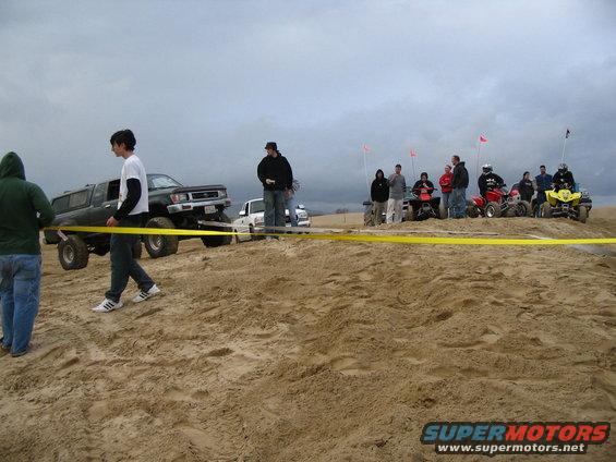 img_2562.jpg Strap on the front hook and one around the silders...