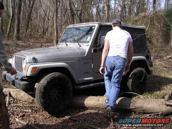 dscn0935.jpg Derrick's TJ high-centered on a log
